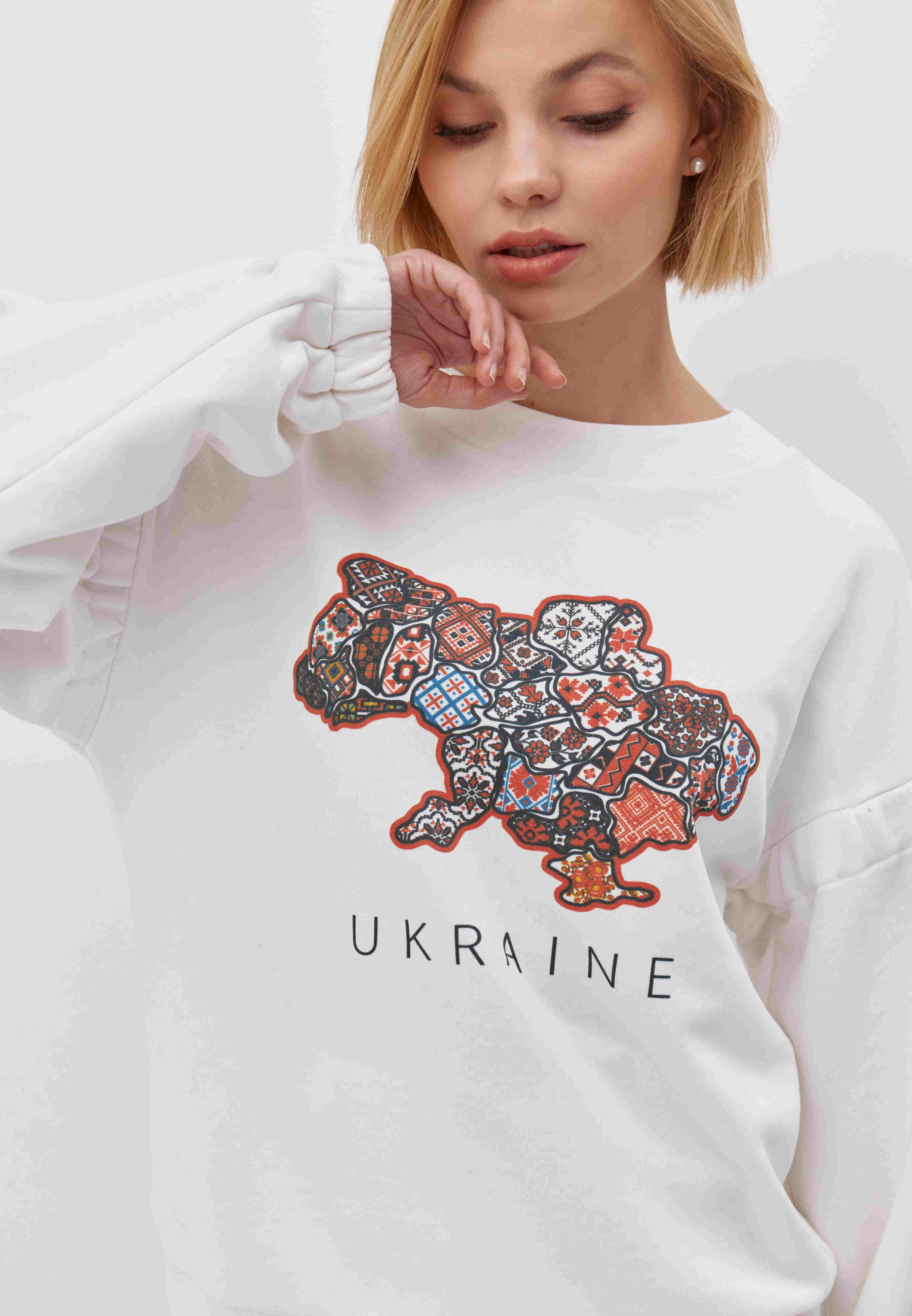 Картинка Білий світшот з принтом